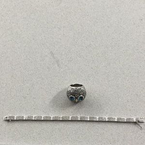 Tennis braclet faux diamonds and owl ring.
